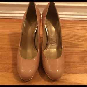 Stuart Weitzman patent leather round toe pumps